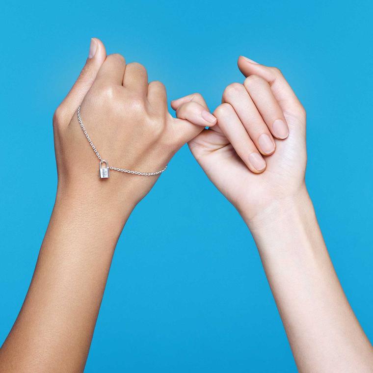 Join Louis Vuitton and UNICEF by locking pinkies