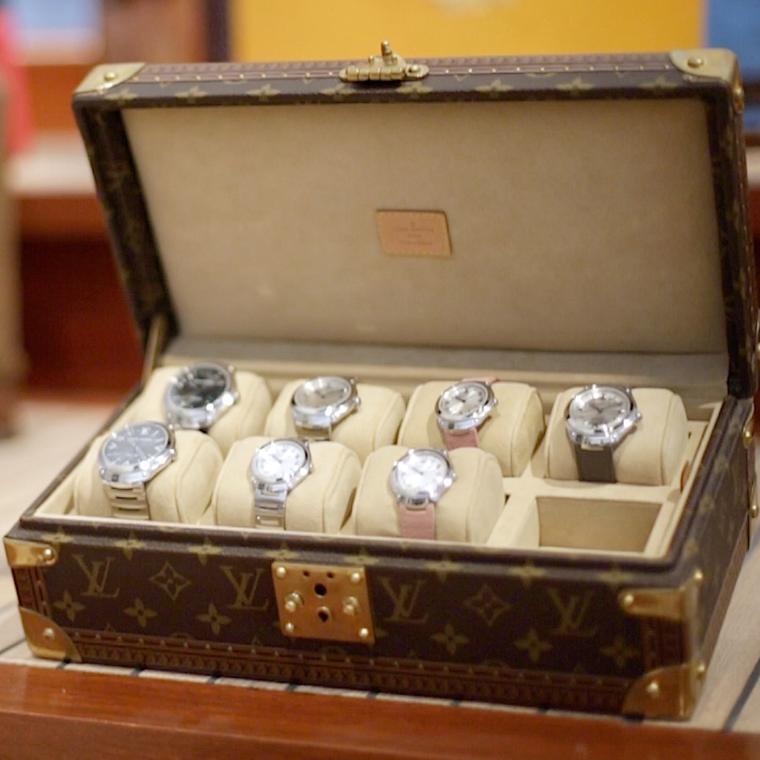 Louis Vuitton Fifty Five watches in LV trunk