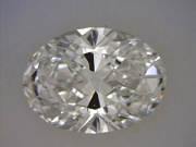 1.09 carat E VS1 oval diamond with bowtie