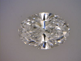 oval diamond with small bow tie 