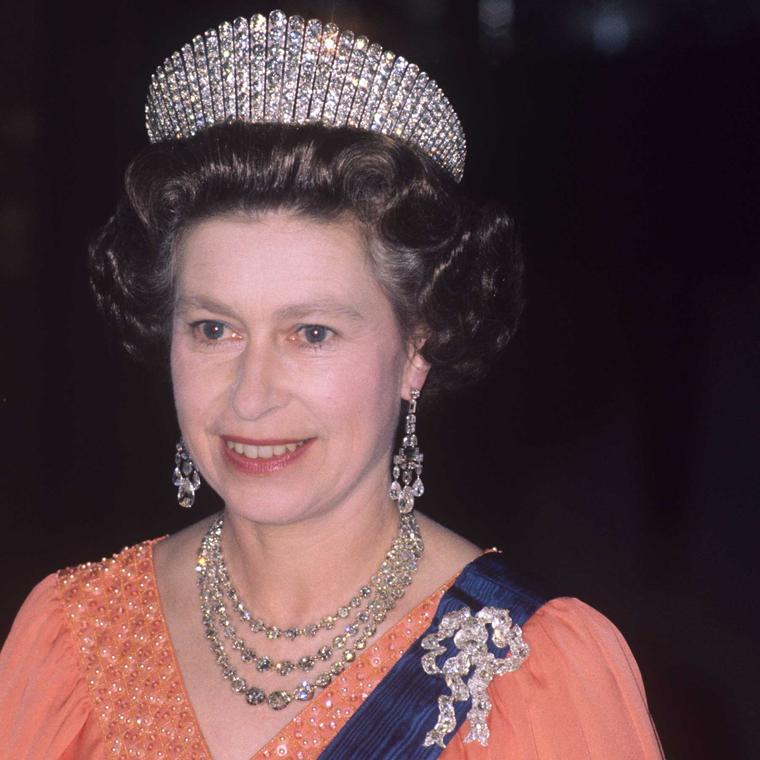 The Queen wearing the Russian Kokoshnik Tiara and Queen Mary Lover’s Knot bow brooch 