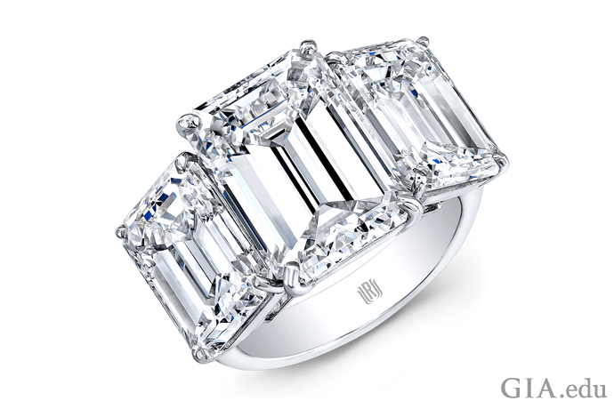 Three-stone diamond engagement ring totaling 15.00 carats.