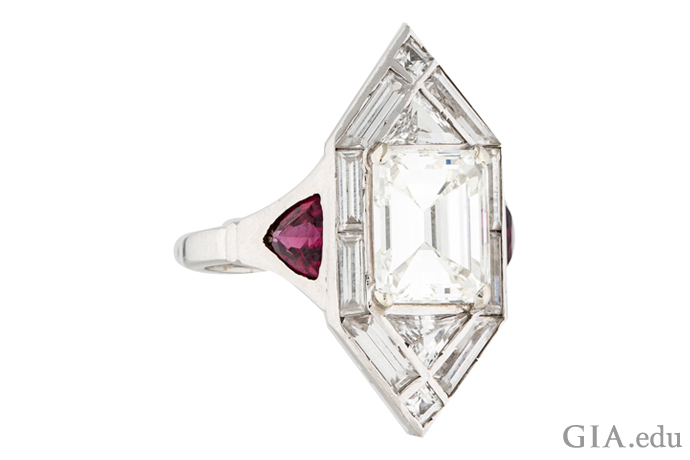 A 2.40 ct Art Deco engagement ring with 0.85 carats of baguettes, triangular diamonds and trilliant cut synthetic rubies