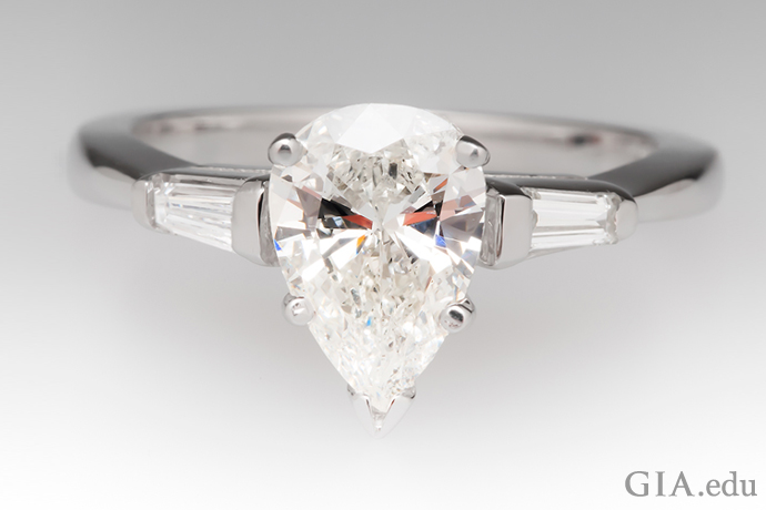 Pear-shaped diamond engagement ring.