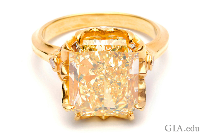 This dramatic 8 carat (ct) radiant cut yellow diamond is an alluring choice for a diamond engagement ring.