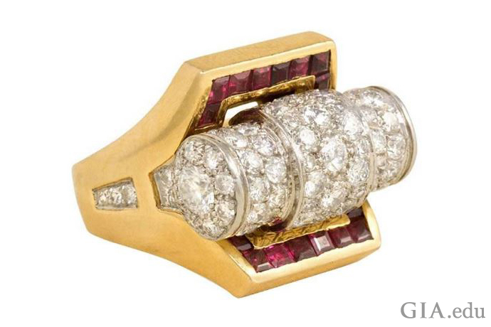 Retro ring boasts three cylindrical pavé set diamond scrolls with a total weight of 2.50 carats.
