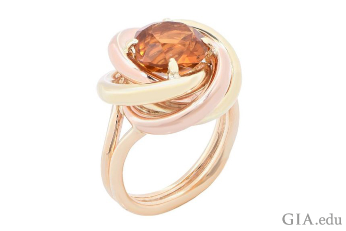 A Cartier creation of the 1940s, this “Love Knot” ring features a citrine surrounded by both rose and yellow gold.