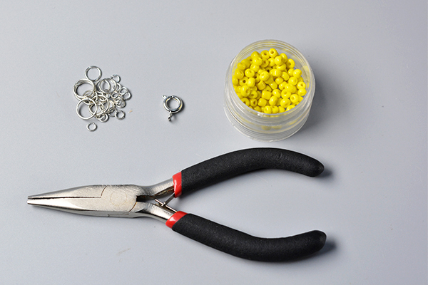Supplies you’ll need in making the yellow seed bead necklace: