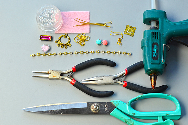 Materials and tools needed to make the vintage style chandelier earrings: