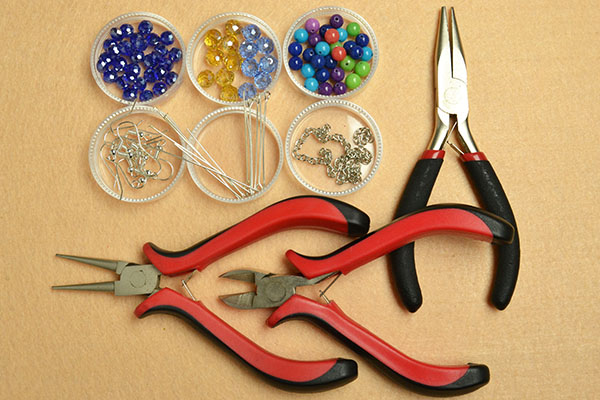 Materials and tools needed for glass and jade beads earrings: