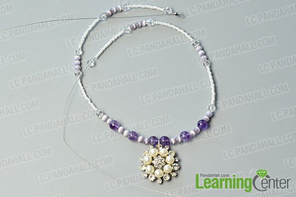 Complete the first strand of the necklace