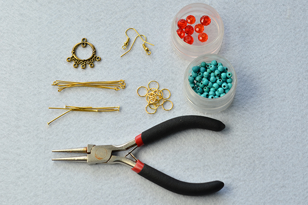 Tools and materials needed to make the turquoise bead chandelier earrings:
