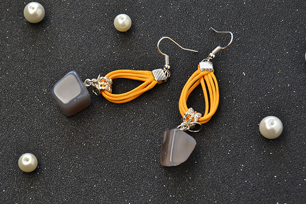 Another picture for the orange dangle earrings.